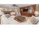Spacious living room with fireplace, tv and custom cabinetry with plenty of room for entertaining at 1425 Hallam Dr, Lakeland, FL 33813