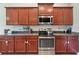 Beautiful kitchen offering ample cabinet space, modern appliances and updated countertops at 1531 Blue Sky Blvd, Haines City, FL 33844
