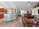 Spacious living area seamlessly connects to the open kitchen, perfect for entertaining at 1531 Blue Sky Blvd, Haines City, FL 33844