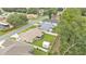 Aerial view showcasing a home with a fenced backyard and shed in a well-maintained neighborhood at 1746 Grey Fox Dr, Lakeland, FL 33810