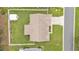 Bird's eye view of a home featuring a fenced yard, shed, and paved driveway at 1746 Grey Fox Dr, Lakeland, FL 33810