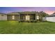 Spacious backyard and covered patio at 1746 Grey Fox Dr, Lakeland, FL 33810