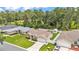 Lovely home exterior with well-manicured lawn, fenced backyard, shed, and paved driveway at 1746 Grey Fox Dr, Lakeland, FL 33810