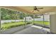 The covered patio overlooks the fenced-in yard at 1746 Grey Fox Dr, Lakeland, FL 33810