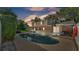 Backyard showcasing a refreshing swimming pool and outdoor lounging area at 1910 Clubhouse Rd, Lakeland, FL 33813