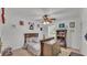 Charming bedroom with a ceiling fan, dresser, and themed decor at 1910 Clubhouse Rd, Lakeland, FL 33813