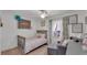 Bright bedroom with ceiling fan and a cozy reading nook by the window at 1910 Clubhouse Rd, Lakeland, FL 33813