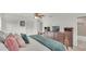 Comfortable bedroom with wooden dresser, cozy bed, and ample closet space at 1910 Clubhouse Rd, Lakeland, FL 33813