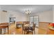 Cozy dining room with wooden floors and natural light from the glass doors at 1910 Clubhouse Rd, Lakeland, FL 33813