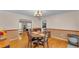 Open dining room showcasing hardwood floors and seamless flow to other areas at 1910 Clubhouse Rd, Lakeland, FL 33813