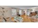 Comfortable living room with hardwood floors and two large windows at 1910 Clubhouse Rd, Lakeland, FL 33813