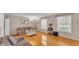 Spacious living room features hardwood floors and plenty of natural light at 1910 Clubhouse Rd, Lakeland, FL 33813