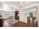 Open concept space showing the kitchen, island, living room, and natural light at 2110 Bristol Ave, Lakeland, FL 33803