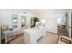 Sun-filled office with neutral colors, white trim, and a large work space at 2110 Bristol Ave, Lakeland, FL 33803