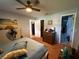 Comfortable bedroom with ample closet space and access to the bathroom at 2424 Bates Sw Ave, Winter Haven, FL 33880