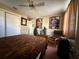 Bedroom with wooden chair and fan at 2424 Bates Sw Ave, Winter Haven, FL 33880