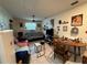 Relaxing living room features comfortable seating, quirky decor, and a ceiling fan at 2424 Bates Sw Ave, Winter Haven, FL 33880