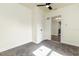 Bedroom featuring new carpet, a ceiling fan, and a doorway to another room at 2711 Crutchfield Rd, Lakeland, FL 33805