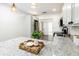 Well-lit kitchen area with granite countertops, stainless steel appliances and eat-in counter space at 2711 Crutchfield Rd, Lakeland, FL 33805