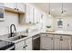 Updated kitchen featuring granite countertops, stainless steel appliances, ample cabinet space, and modern fixtures at 2711 Crutchfield Rd, Lakeland, FL 33805