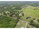 Spacious lot featuring a home, barn, and pool at 2911 Walker Rd, Lakeland, FL 33810