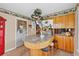 Spacious kitchen with a large island, granite countertops, and wooden cabinetry at 2911 Walker Rd, Lakeland, FL 33810