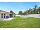 Enjoy the outdoors with a patio, in-ground pool, and a home with a black painted chimney at 3080 Cross Fox Dr, Mulberry, FL 33860