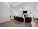 Spacious living room featuring a fireplace, wood floors, and comfortable seating arrangement at 3080 Cross Fox Dr, Mulberry, FL 33860
