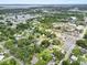Aerial view of the neighborhood and a lake in the distance at 320 W Carver St, Lakeland, FL 33805