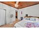 Bright bedroom with a wood ceiling, tile floors, and neutral wall colors at 320 W Carver St, Lakeland, FL 33805