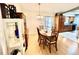 Cozy dining room with a hardwood table set and elegant hardwood floors at 355 Pico Ct, Lakeland, FL 33809