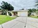 Lovely single-story home with an attached garage and inviting curb appeal at 355 Pico Ct, Lakeland, FL 33809