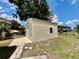 Exterior side angle of the metal garage in the yard at 355 Pico Ct, Lakeland, FL 33809