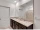 Charming bathroom with granite countertops, dual sinks, and a shower and bath combo at 3685 Diving Dove Ln, Bartow, FL 33830