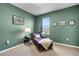 Green accent bedroom with mushroom decor and comfortable seating at 3685 Diving Dove Ln, Bartow, FL 33830