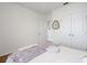 Neutral bedroom with closet doors and natural light at 3685 Diving Dove Ln, Bartow, FL 33830