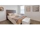 Bright bedroom with neutral decor and soft furnishings at 3685 Diving Dove Ln, Bartow, FL 33830