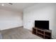 Simple loft area with a TV on a wooden stand at 3685 Diving Dove Ln, Bartow, FL 33830