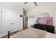 Bedroom featuring hardwood floors, closet space, and a ceiling fan at 4124 Prima Lago Cir, Lakeland, FL 33810