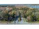 A picturesque community entrance with tree-lined streets and well-maintained landscaping at 4124 Prima Lago Cir, Lakeland, FL 33810