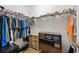 Organized walk-in closet with shelving and racks for ample storage at 4124 Prima Lago Cir, Lakeland, FL 33810