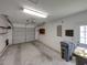 Two car garage features shelving and an automatic door opener at 4926 Pleasant Hollow Trl, Lakeland, FL 33811