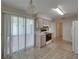 Practical kitchen setup featuring essential appliances and exterior access, blending utility with convenience at 4926 Pleasant Hollow Trl, Lakeland, FL 33811