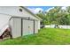 Backyard scene showcasing a shed and play area at 5316 Forestbrook E Dr, Lakeland, FL 33811