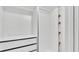 Organized closet featuring drawers, hanging rods, and adjustable shelves at 5316 Forestbrook E Dr, Lakeland, FL 33811