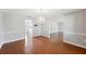 Formal dining room with chair railing and modern chandelier at 5619 Stratford Ln, Lakeland, FL 33813