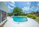 Refreshing pool with a large deck and surrounded by lush landscaping, creating a private oasis at 5619 Stratford Ln, Lakeland, FL 33813