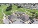 Aerial view of the golf course and clubhouse in this beautiful community at 6001 Condor Dr, Lakeland, FL 33809
