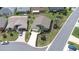 Stunning aerial view of a home featuring lush landscaping, a long driveway, and a well manicured lawn at 6001 Condor Dr, Lakeland, FL 33809