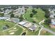 Aerial shot of homes along a golf course with lush fairways and scenic community views at 6001 Condor Dr, Lakeland, FL 33809